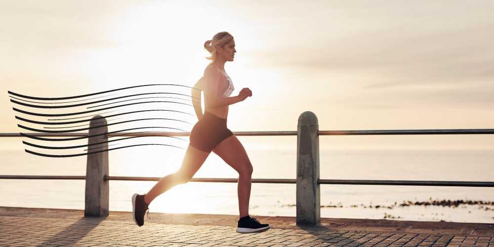 A person running outdoors to reduce cortisol-induced belly fat.